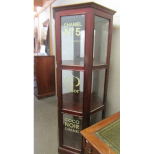 2510 - An octagonal display cabinet sign written of Chanel No. 5. (collect only)