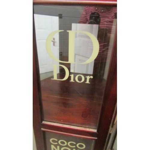 2510 - An octagonal display cabinet sign written of Chanel No. 5. (collect only)