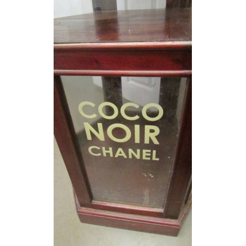 2510 - An octagonal display cabinet sign written of Chanel No. 5. (collect only)