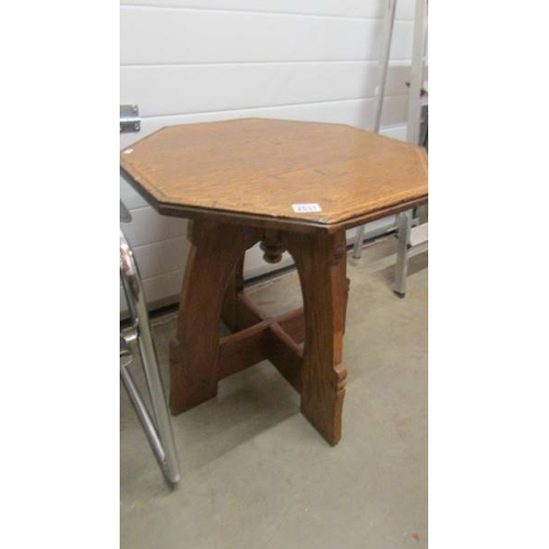 2531 - An oak arts and a crafts oxagonal table. (collect only)