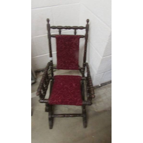 2532 - A Victorian child's American rocking chair. (collect only)