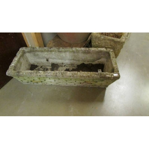 2533 - Two oblong garden planters and a large a/f planter. (collect only)