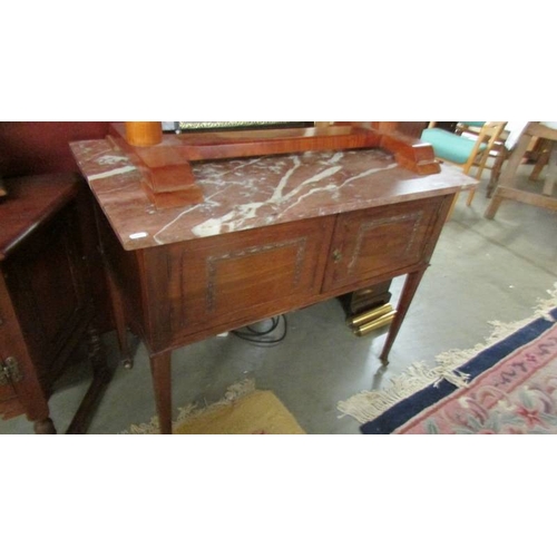 2542 - A marble topped hall table. (collect only)