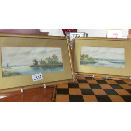 2544 - A pair of gilt framed and glazed watercolours of water/cottage scenes signed J Russell, images 24 x ... 