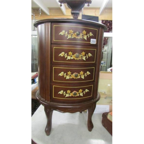 2550 - A good quality oval mahogany inlaid four drawer chest. (collect only)