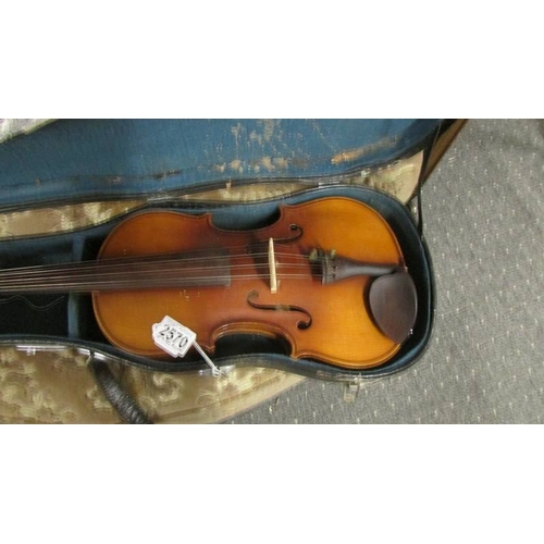 2570 - An old violin in hard case.