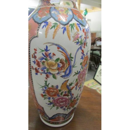 2603 - A tall oriental vase. (collect only)