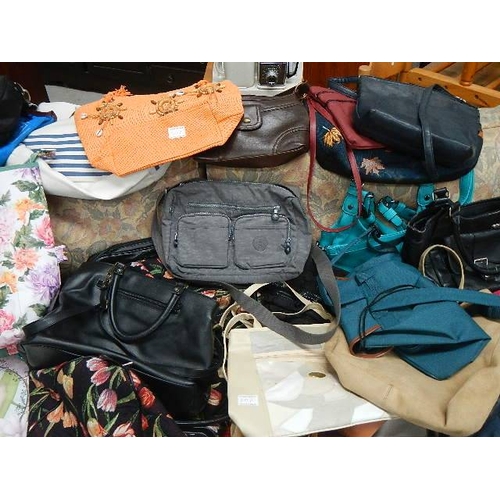 507 - A good lot of hand bags including Kipling, (collect only)