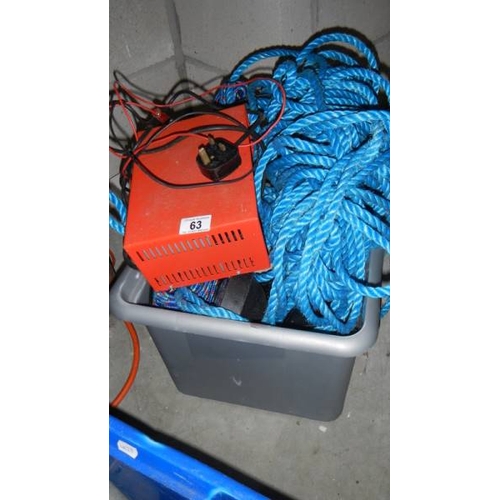 63 - A battery charger and a quantity of rope. (collect only)