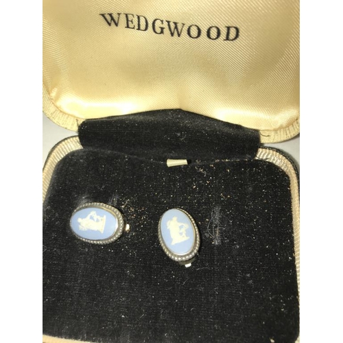 2084 - Three Wedgwood pendants, a Wedgwood brooch, a pair of Wedgwood earrings and a Wedgwood ring.