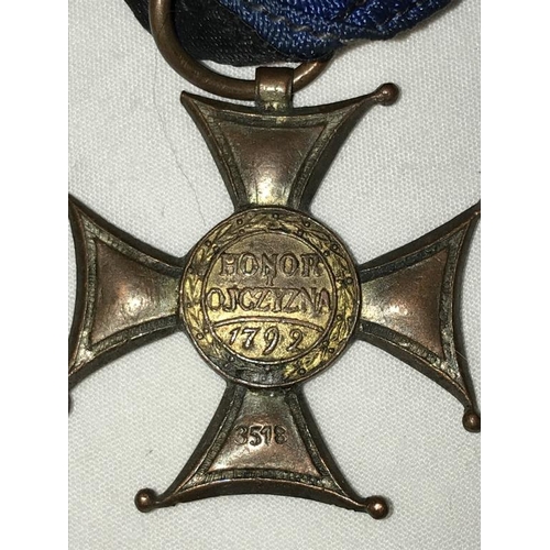 2117 - A Polish War Order of Virtuti Militari for Kamierz Kubicz along with Polish Independence Cross witho... 