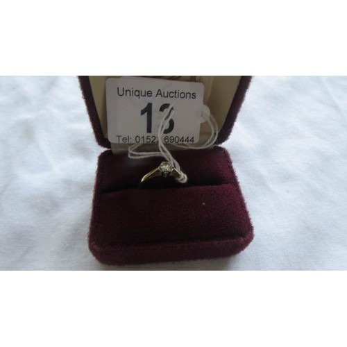 13 - An 18ct gold diamond solitaire ring, size M.