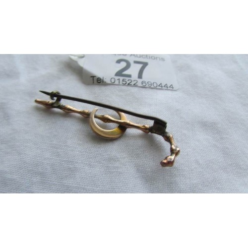 27 - A 9ct gold bar brooch set with seed pearls.