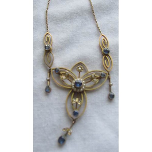 35 - A 9ct gold necklace set sapphire and seed pearls.