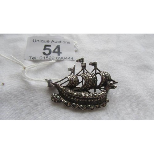 54 - A silver marcasite brooch as a viking ship.