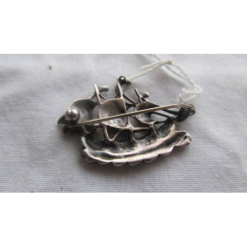 54 - A silver marcasite brooch as a viking ship.