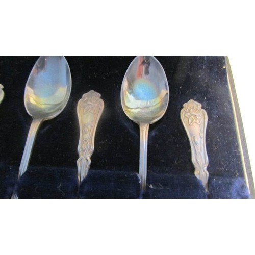 69 - A cased set of six silver teaspoons.