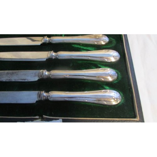 70 - A cased set of six Mappin and Webb butter knives.