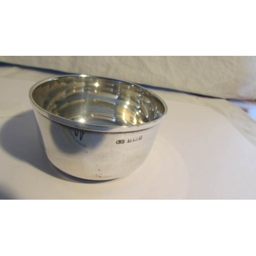 84 - A silver tea strainer.