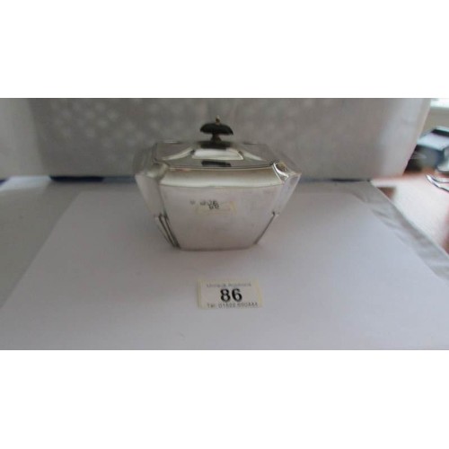 86 - A silver sugar bowl with cover.