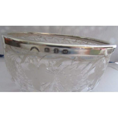 89 - A silver rimmed cut glass bowl.