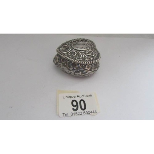 90 - A heart shaped silver pill box.