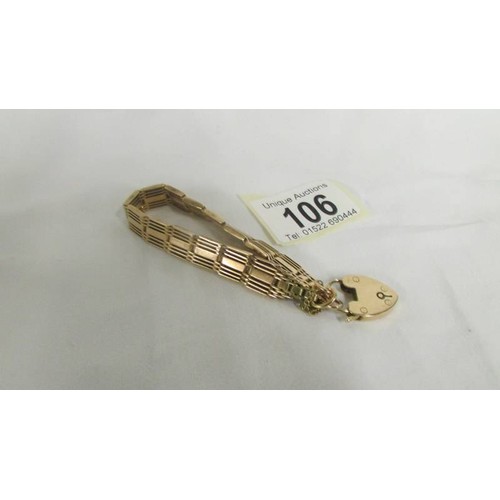 106 - A 15 carat gold bracelet with padlock.