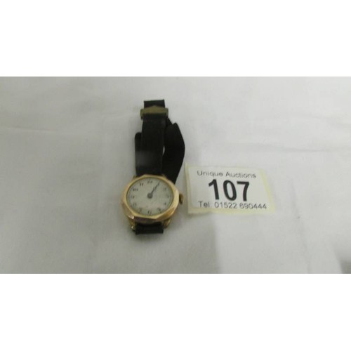 107 - A ladies gold cased wrist watch.