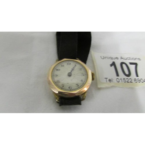 107 - A ladies gold cased wrist watch.