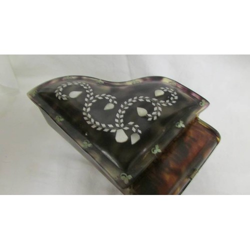 192 - A Victorian faux tortoiseshell and mother of pearl musical jewellery box in the form of a grand pian... 