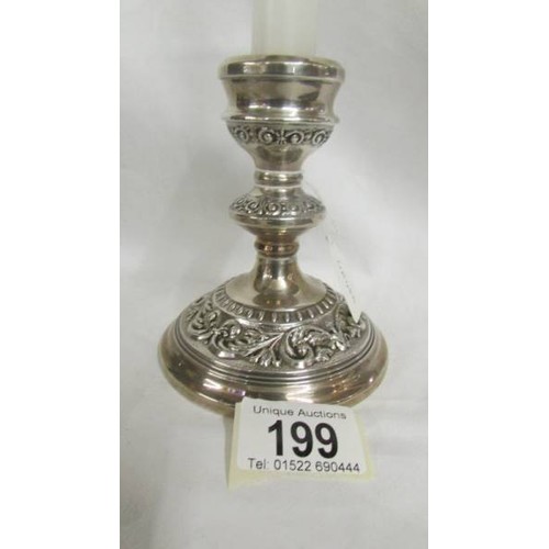 199 - A silver candlestick.