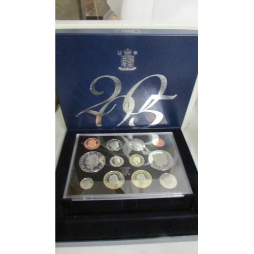 222 - A 2005 UK Battle of Trafalgar Nelson proof set and a Year 2000 executive proof coin collection.