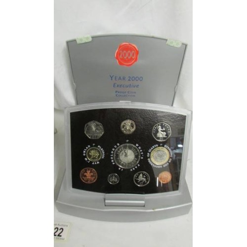 222 - A 2005 UK Battle of Trafalgar Nelson proof set and a Year 2000 executive proof coin collection.