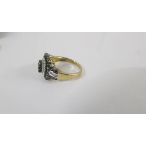 120 - A square shaped yellow gold diamond and sapphire ring, size M.