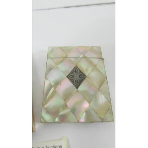 242 - Two mother of pearl card cases.