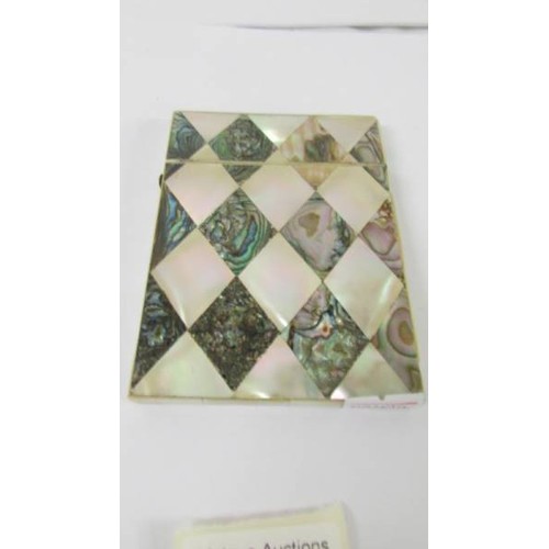 244 - A mother of pearl and abalone card case.