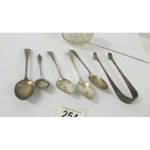 254 - A silver top bowl (top a/f), five silver teaspoons and silver sugar tongs,