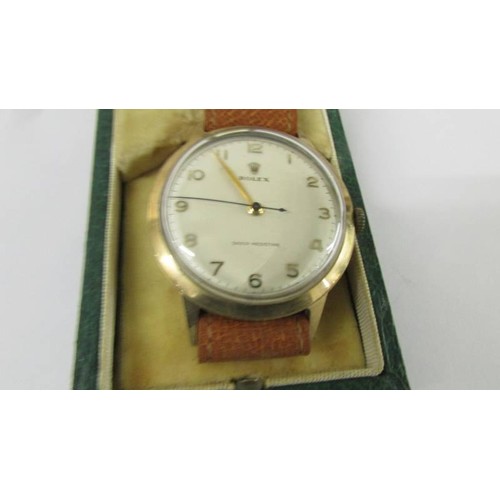 132 - A 9ct gold gent's Rolex wrist watch, marked ALD421309, 13874 Dennison, Made in England for Rolex.