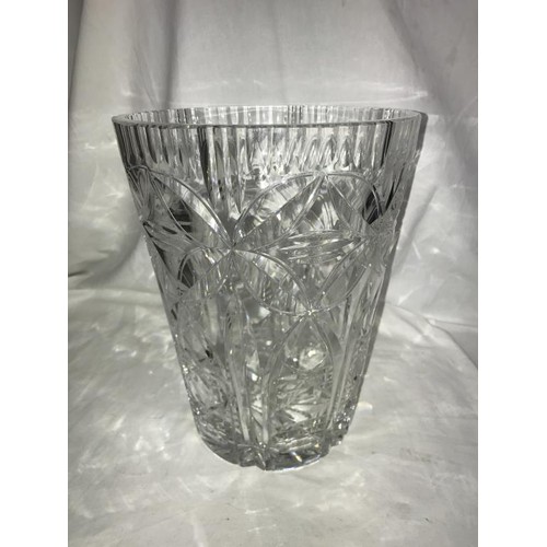 210 - A heavy cut glass vase, 23cm tall, 8.5 cm diameter at top.