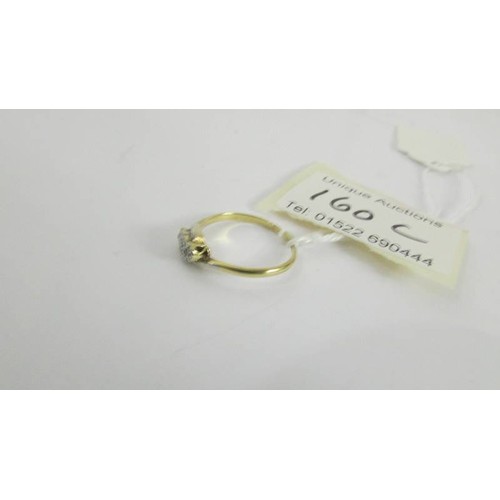 160D - A 9ct gold wedding ring and an unmarked eternity ring, size N.