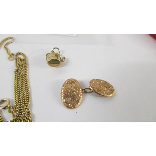 160J - A 9ct gold chain, a gold cuff link and a gold kettle charm, 8.5 grams.