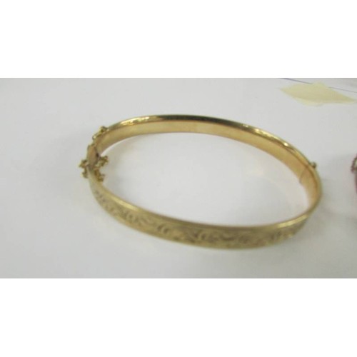 160L - Two 9ct gold bangles, 26.5 grams (one has dents).