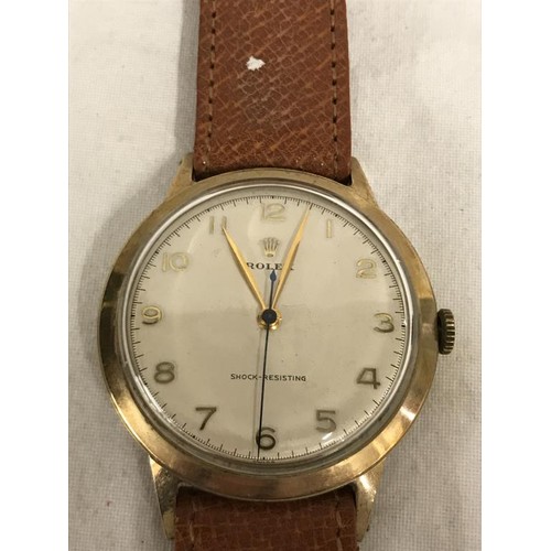 132 - A 9ct gold gent's Rolex wrist watch, marked ALD421309, 13874 Dennison, Made in England for Rolex.