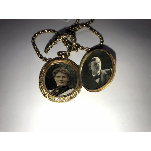 50 - A 15 ct gold locket. 10 grams, on a gold chain 8.8 grams.