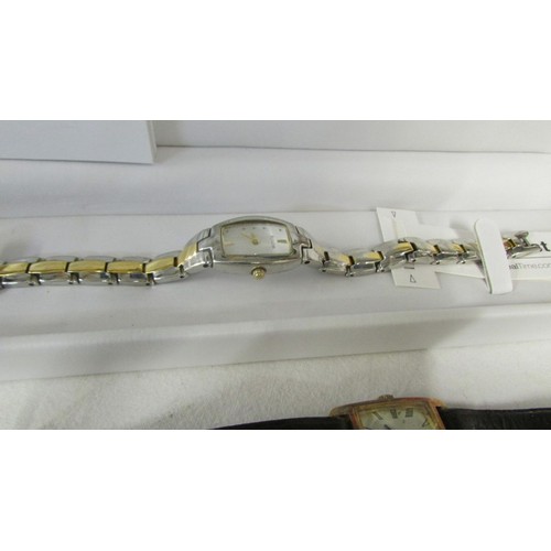 1001 - Four ladies wrist watches including Accurist, Seiko etc.,