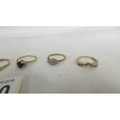 1020 - Six 9ct gold rings.