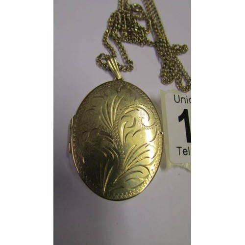 1056 - A 9ct gold locket on a 9ct gold chain, 17.6 grams.