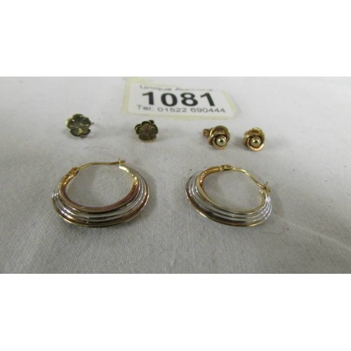 1081 - A pair of 9ct gold hoops together with two pairs of 9ct gold studs.