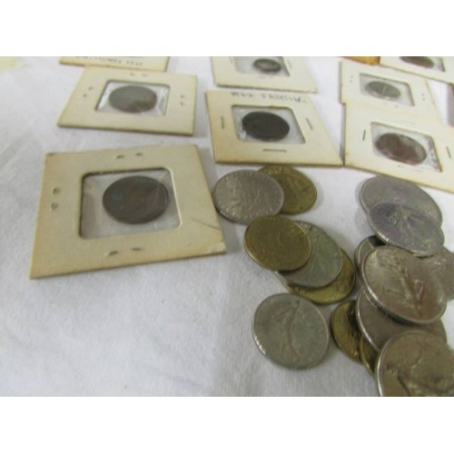 1108 - A mixed lot of USA, UK and French coins including 1923 one dollar. 1836 5 cent, 1945 shilling, franc... 