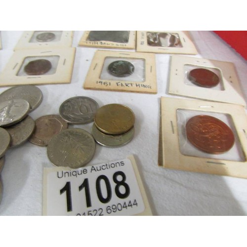 1108 - A mixed lot of USA, UK and French coins including 1923 one dollar. 1836 5 cent, 1945 shilling, franc... 